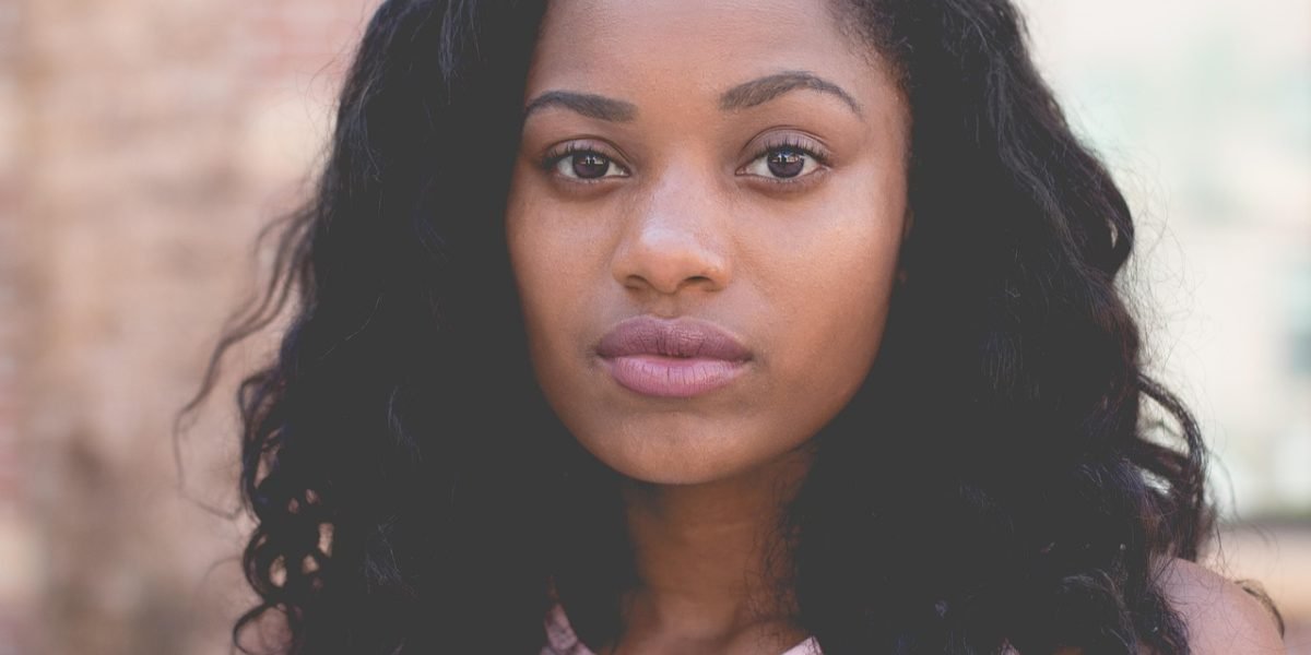 A confident student focuses on personal strengths and interests while planning for college admissions.