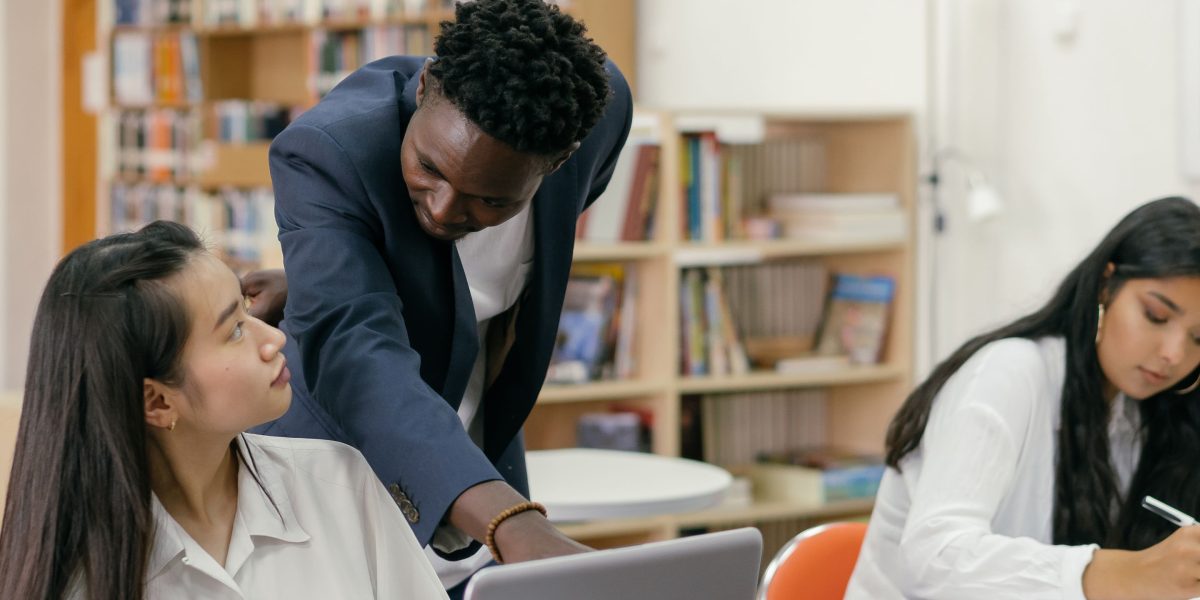 A pre-med student receives guidance from an advisor, navigating academic and extracurricular pathways for medical school.