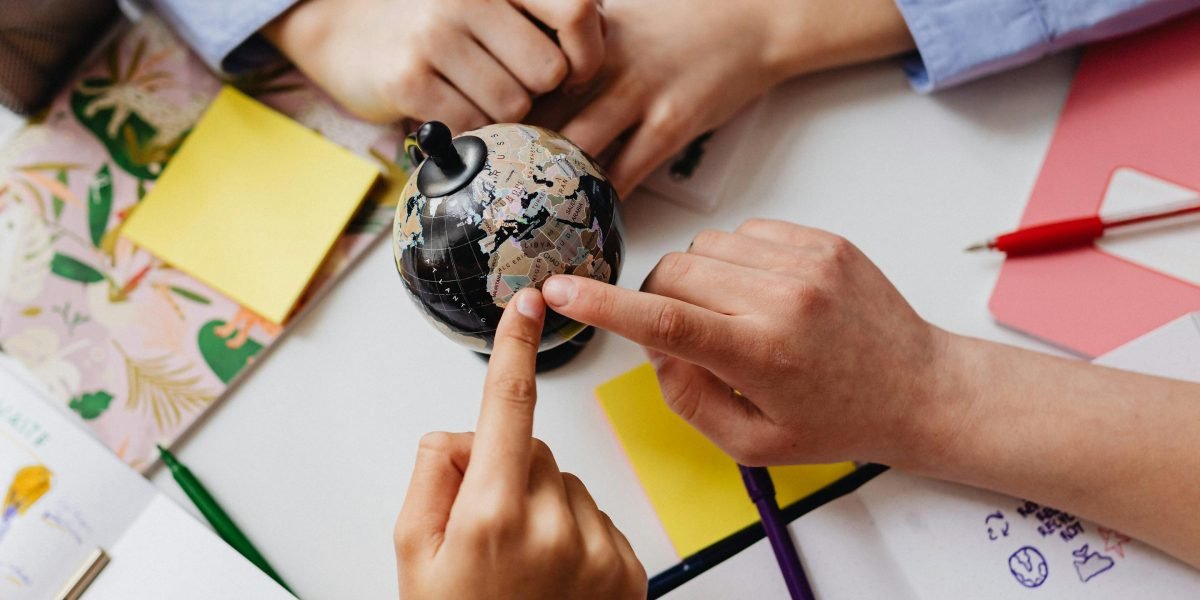Students work together on a project, embodying the collaborative learning environment fostered at universities.