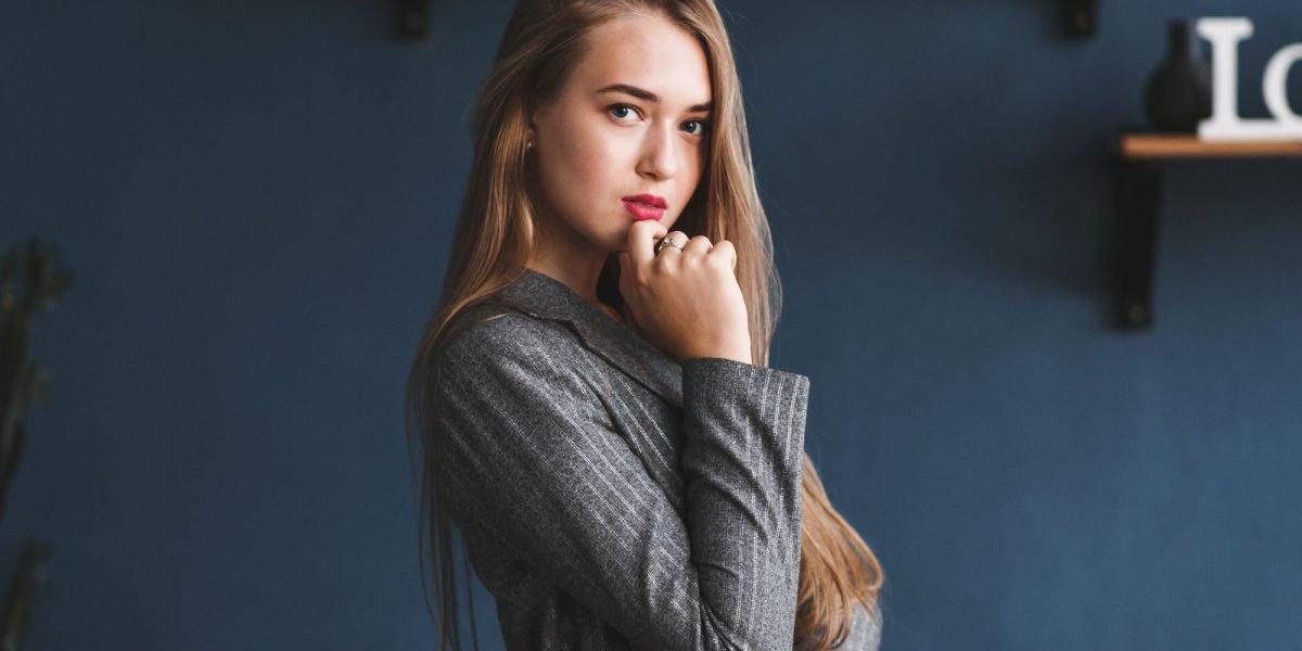 A confident student feeling positive about their college application journey after applying strategically.
