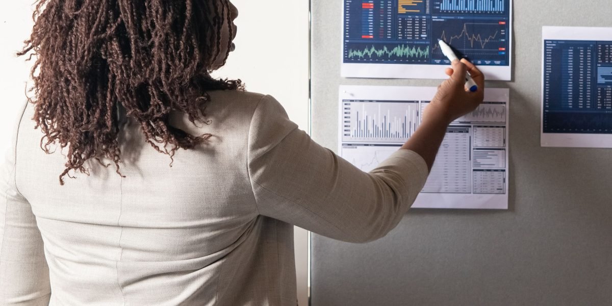 A person looks confused or misled by a chart or document, illustrating the initial feeling of being tricked by data.