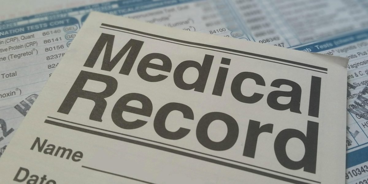 A healthcare professional carefully reviewing patient data, emphasizing the importance of consistent and reliable measurements.