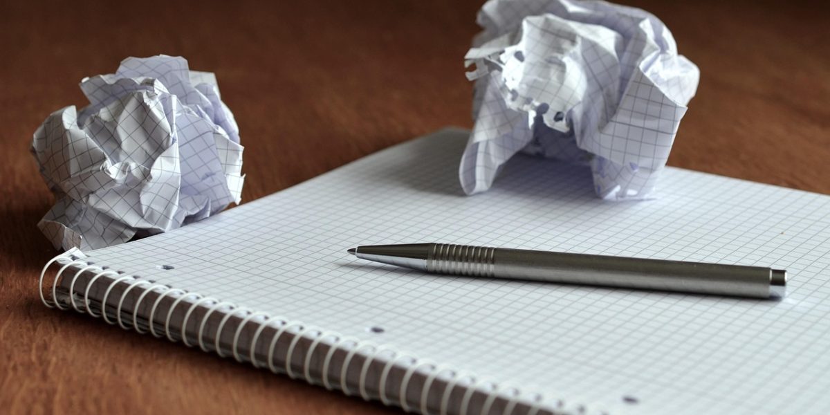 A person carefully analyzing data and strategizing their university application process.