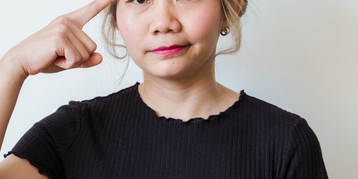 A person engaged in thoughtful decision-making, using a structured approach to evaluate important career choices.